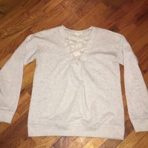 Maurice’s cream sweatshirt